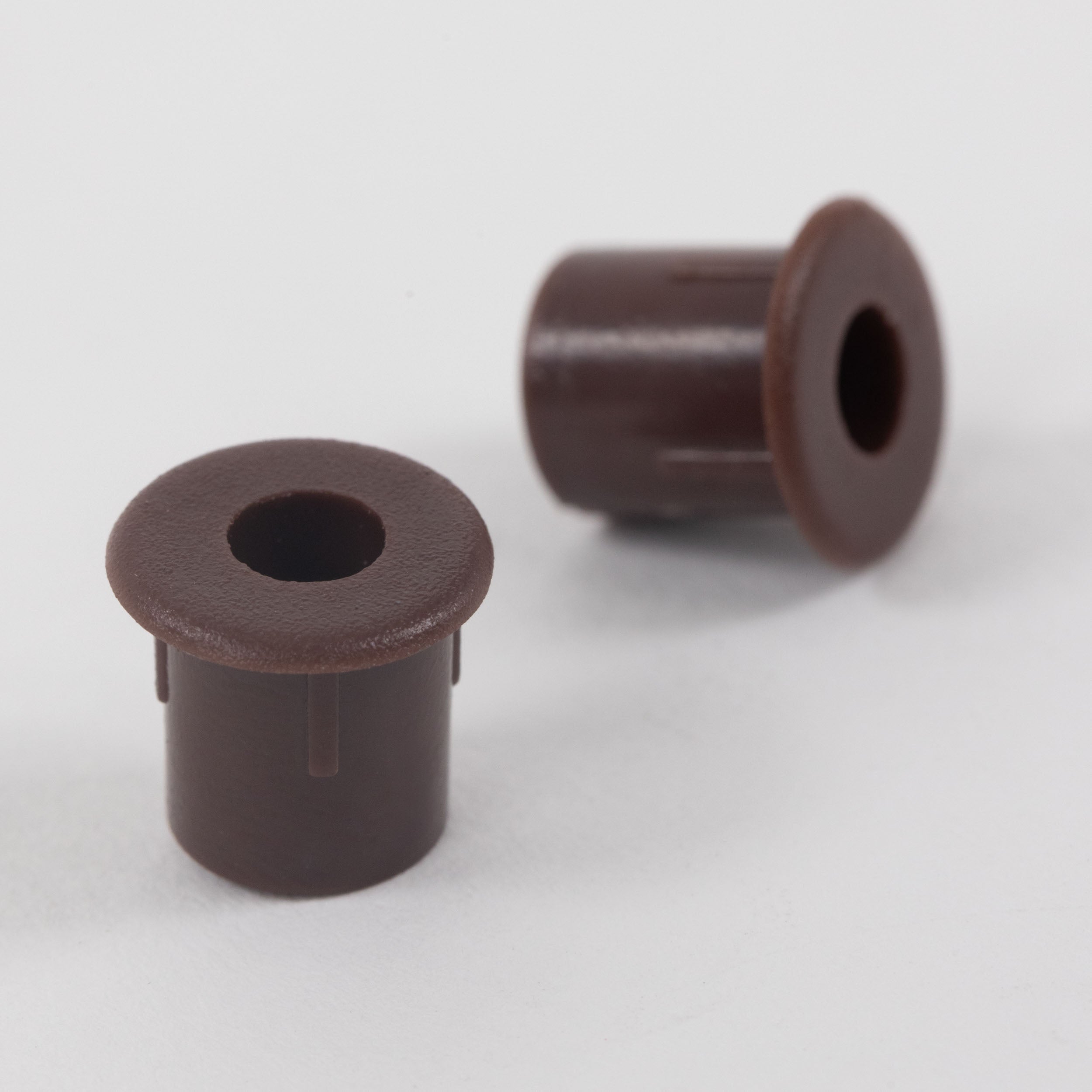 Casquillo Plástico Café 100 und.